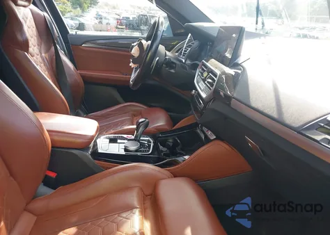 2022 BMW X4 M z USA, uszkodzony, nr VIN 5YM23EC00N9J37507